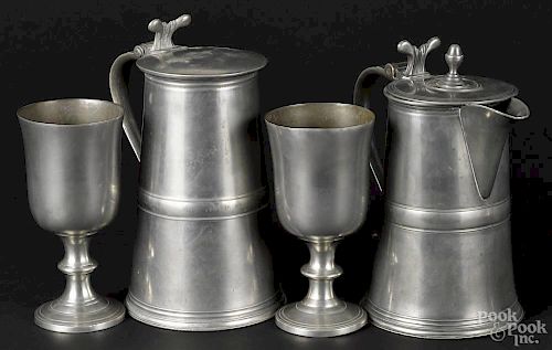 Two Scottish pewter flagons, early 19th c., bearing the marks of J. Wylie and Robert Kinnibrugh