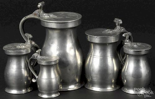 Five graduated English double volute pewter measures, late 18th c., to include a quart, a pint