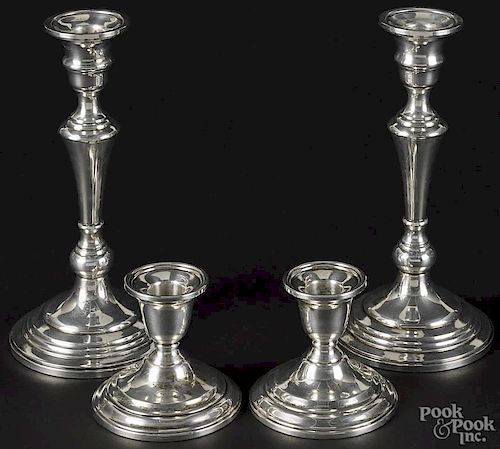 Two pairs of weighted sterling silver candlesticks, by Preisner and International, 8 1/2'' h.