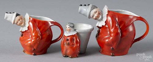Royal Bayreuth porcelain red clown milk pitcher, 4 1/2'' h., together with a creamer, 3 3/4'' h.