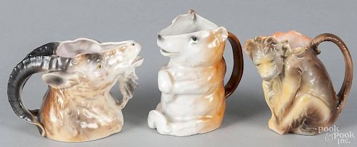 Three Royal Bayreuth porcelain creamers, to include a brown monkey, 4 1/4'' h., a mountain goat