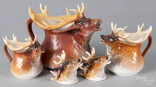 Royal Bayreuth porcelain elk tableware, to include a water pitcher, 7'' h., a milk pitcher, 5 1/4'' h.