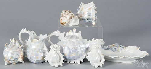 Eight pieces of Royal Bayreuth shell porcelain, to include a teapot, a sugar, a creamer, shakers