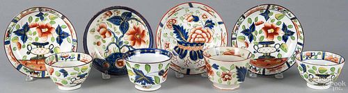 Four Gaudy Dutch porcelain cups and saucers, 19th c., to include dove, urn, and war bonnet patterns.