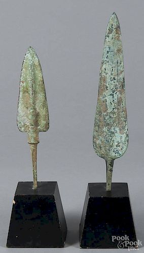 Two Middle Eastern bronze spear points, 9 1/4'' h. and 7 1/2'' h.