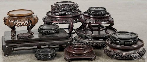 Chinese carved hardwood porcelain stands.