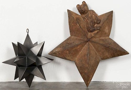 Carved walnut star with a seated bear, 12'' h., together with a tin Moravian star by Wynn Harrison