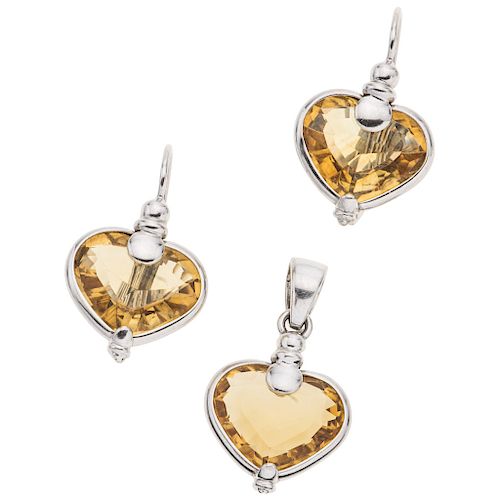 PENDANT AND PAIR OF EARRINGS SET WITH CITRINES. 14K WHITE GOLD