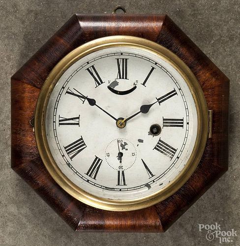 New Haven, Connecticut, regulator wall clock, early 20th c., with a paper label on reverse, 9'' dia.