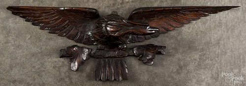Carved mahogany spread winged eagle wall plaque, ca. 1900, 29 1/2'' l.