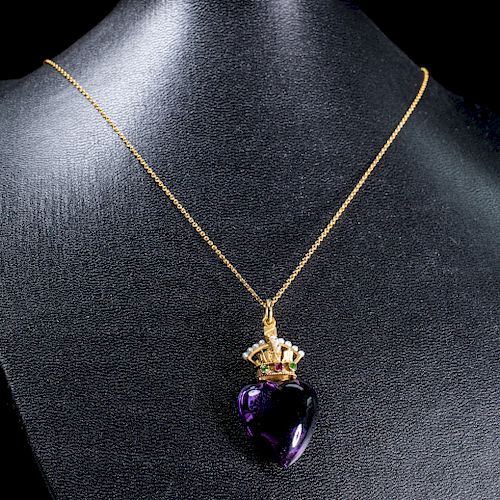 A VICTORIAN AMETHYST PENDANT, the large cabochon heart shap