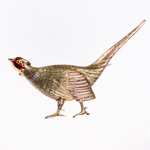 A YELLOW METAL AND ENAMEL BROOCH, modelled as a pheasant of