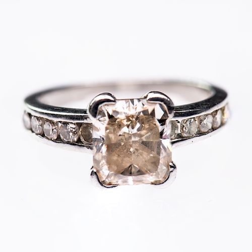 A DIAMOND AND PLATINUM RING, the large square cut diamond f
