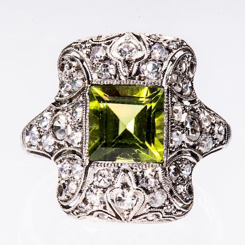A LATE 19TH CENTURY PERIDOT AND DIAMOND RING, the large squ