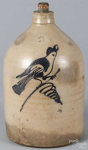 New York two-gallon stoneware jug, 19th c., with cobalt bird on a branch decoration, 13 1/2'' h.