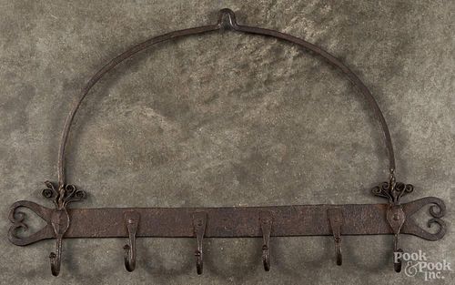 Wrought iron hanger, 19th c., with heart terminals, 24'' w.