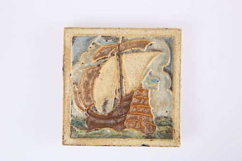 AN ARTS AND CRAFTS POTTERY TILE, PROBABLY AMERICAN, POSSIBL