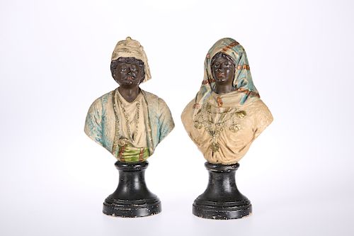 A PAIR OF LATE 19th CENTURY PAINTED TERRACOTTA ORIENTALIST 