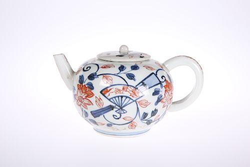 A JAPANESE EDO PERIOD IMARI TEAPOT AND COVER, painted in un
