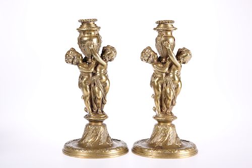 A PAIR OF FRENCH GILT-BRASS FIGURAL CANDLESTICKS, 19TH CENT
