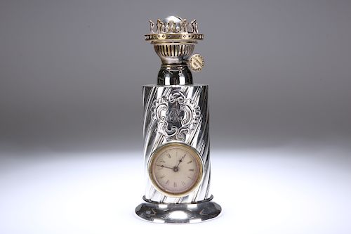 A LATE VICTORIAN SILVER OIL LAMP BASE, INSET WITH A CLOCK, 