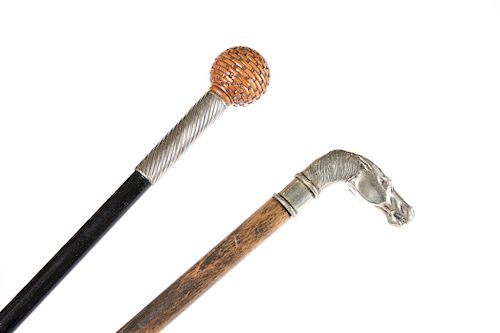 TWO WALKING STICKS, the first with brass horses head handle