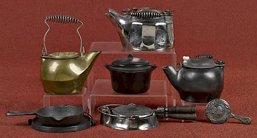 Miniature cast iron cooking items, to include a G