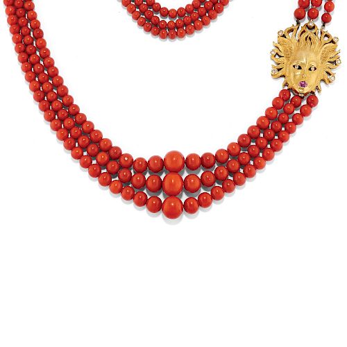 A 18K yellow gold, coral, pink sapphire and diamond necklace