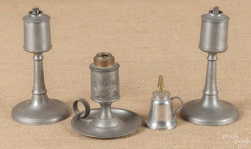 Four American pewter lighting devices, 19th c., t