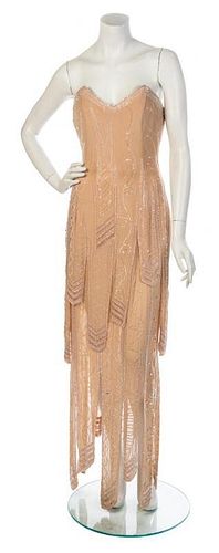 * A Fabrice Beige Silk Beaded Strapless Gown, Size 10.