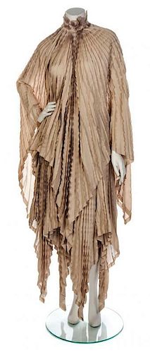 * An Issey Miyake Ivory Pleated Ensemble, Size 3.