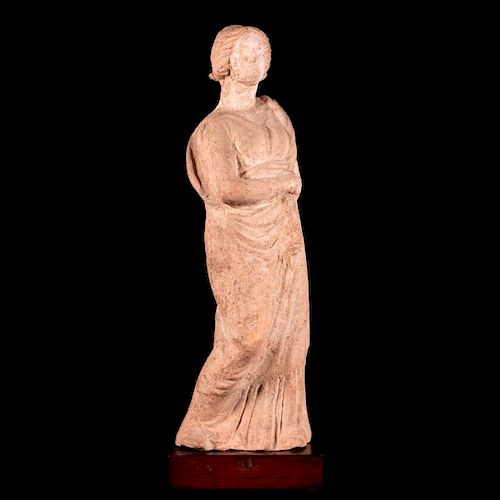An ancient Roman terracotta figure.