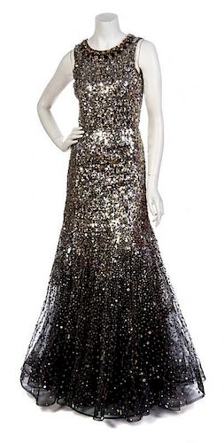 * An Oscar de la Renta Embroidered Black Tulle Sequin Gown, Size 6.