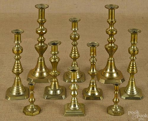 Ten brass candlesticks, late 19th/early 20th c.,