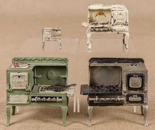 Three cast iron toy gas stoves, to include a Kent