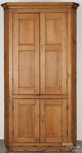 English pine one-piece corner cupboard, ca. 1800, 87 1/2'' h., 44'' w.