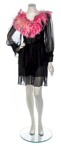 * An Yves Saint Laurent Black Sheer Babydoll Dress, Size 38.