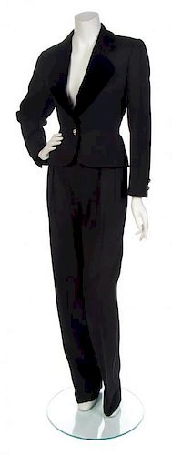 * An Yves Saint Laurent Black Tuxedo, Jacket size 42.