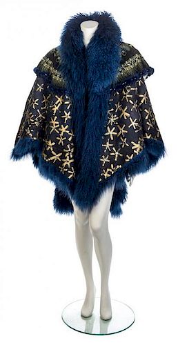 * A Navy Suede and Mongolian Lamb Cape, No size.