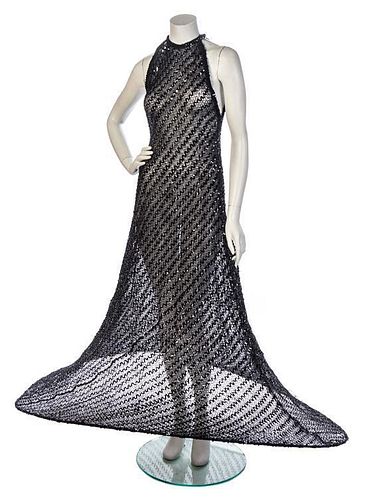 * A Black Sheer Sequin Halter Gown, No size.