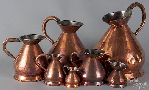 Assembled set of seven English copper haystack measures, 19th c., with VR and GR marks