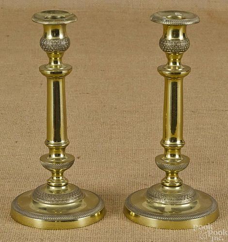 Pair of French brass candlesticks, early 19th c.,