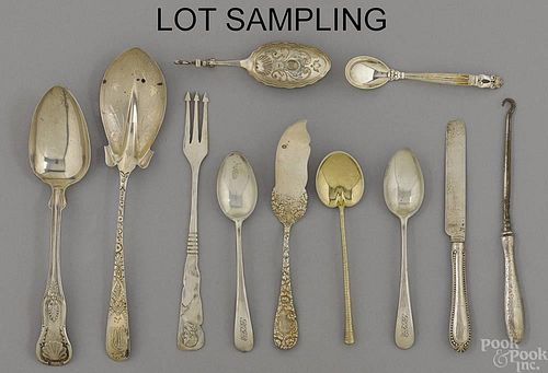 Group of sterling silver and silver-handled flatw