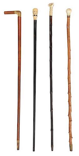 Four Walking Sticks with Bone and Ivory Tops