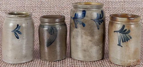 Four Pennsylvania stoneware crocks, 19th c., with