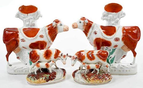 Four Staffordshire Cow Figures