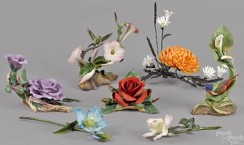 Seven Boehm porcelain bird and flower figures.