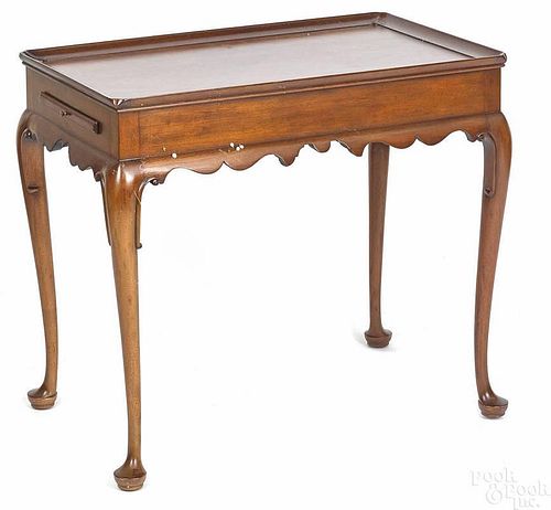 Kittinger Queen Anne style mahogany tea table, 26
