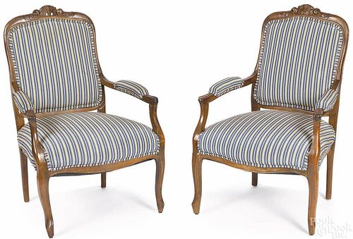 Pair of French upholstered armchairs, 20th c.
