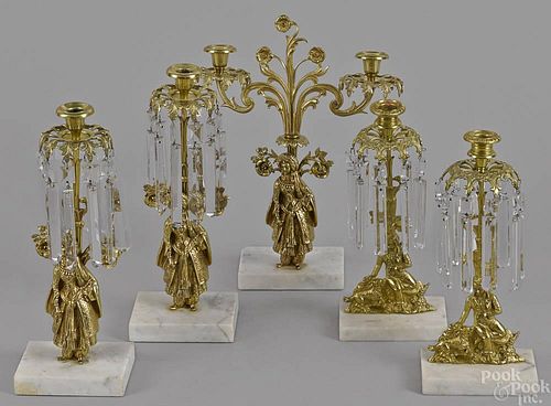 Five brass and marble girandoles, 19th c., with p
